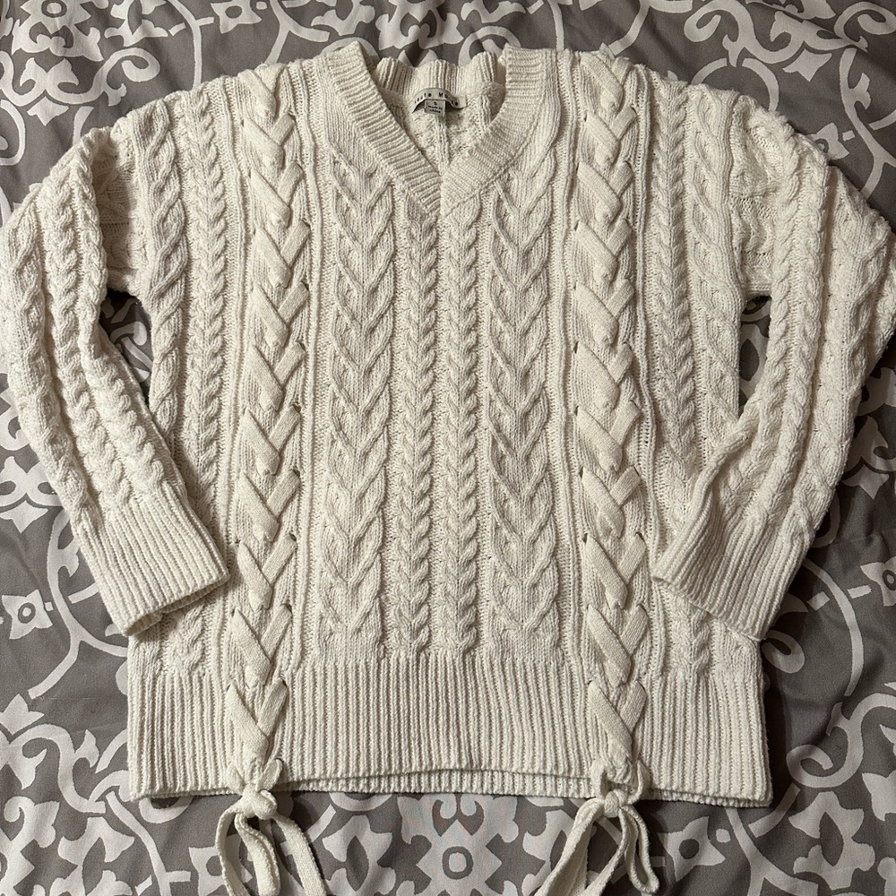 White cable-knit braid sweater